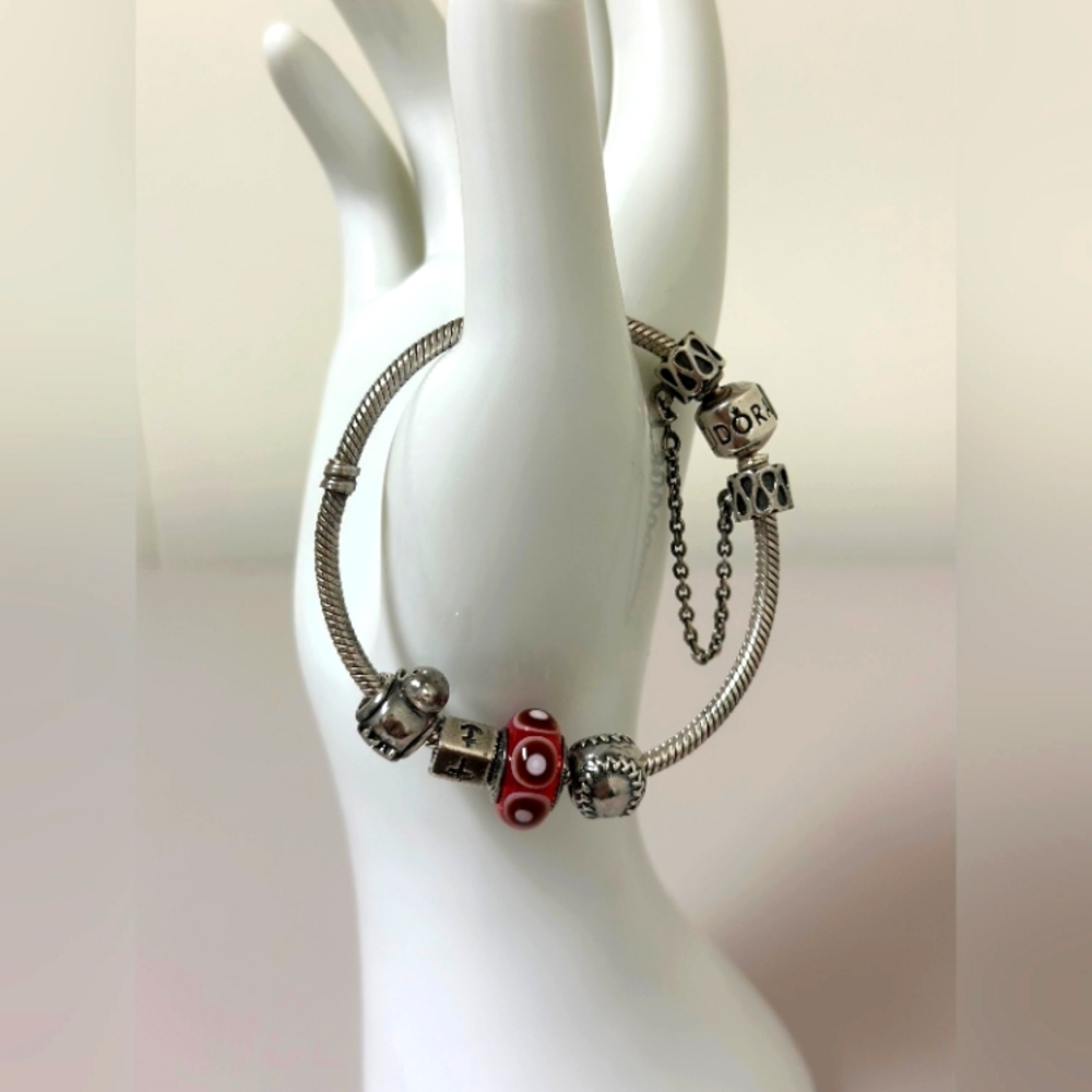 PANDORA s925 ALE Silver, Bracelet with 4 mixed charms 7". with safety chain.